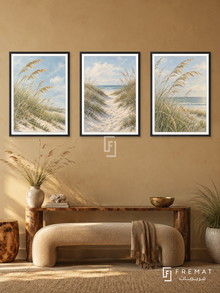Coastal Grasses — set of three complementary nature artworks in Black frames, shown at 50×70 cm each.